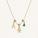 A Lucky Emerald Charm Necklace Gold