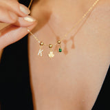A Lucky Emerald Charm Necklace Gold