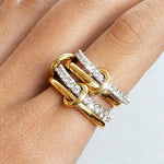 Two-tone stacking ring set worn on the hand