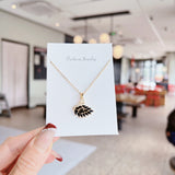 Gold crystal swan necklace, black
