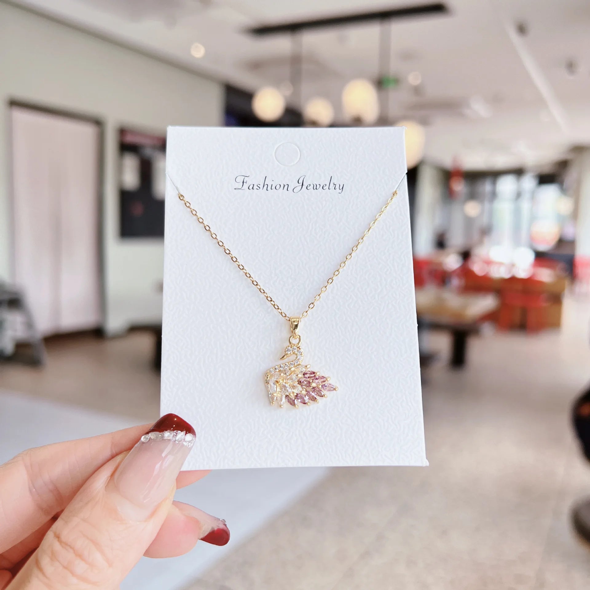 Gold crystal swan necklace, pink ombre