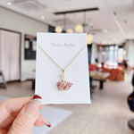 Gold crystal swan necklace, rose