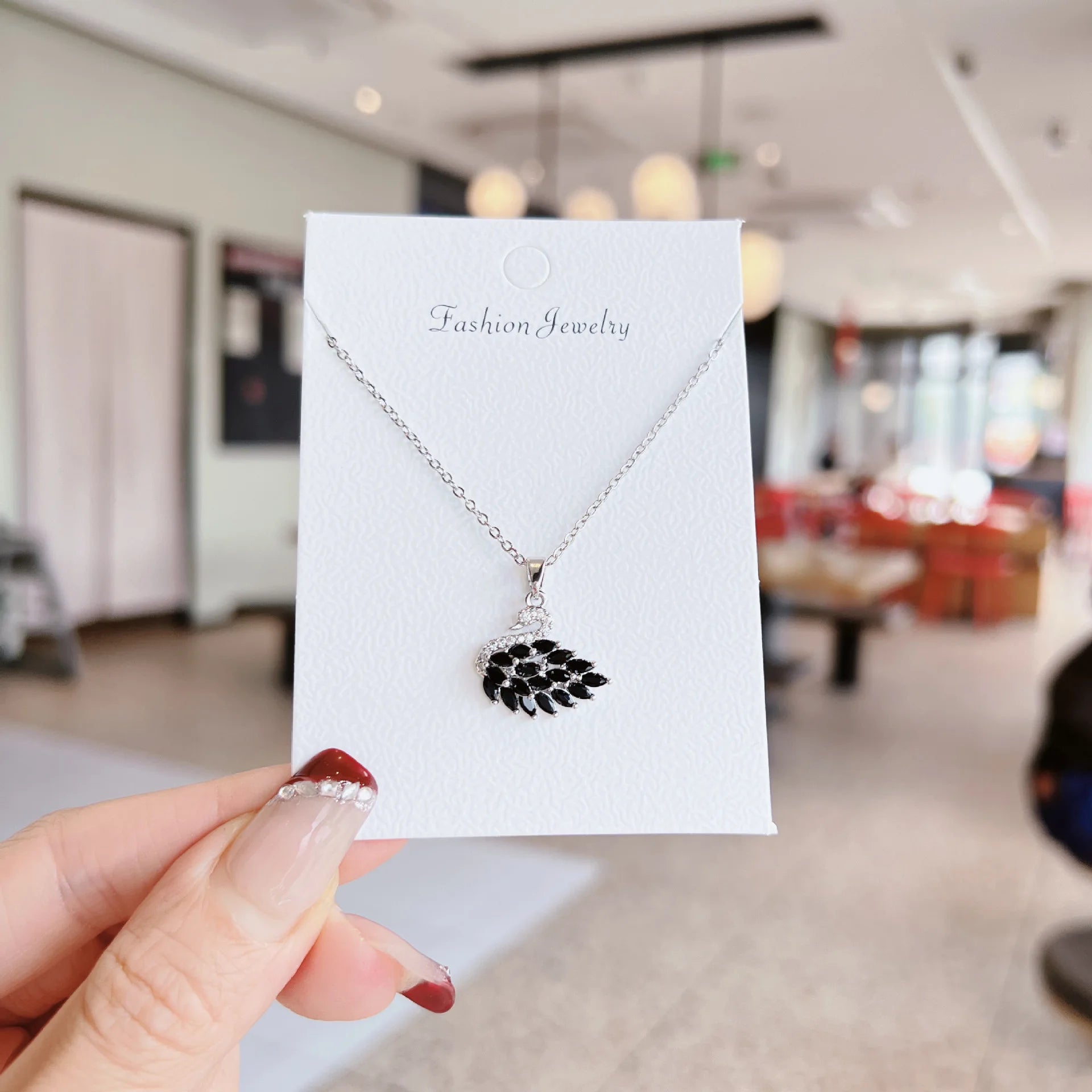 Silver crystal swan necklace, black