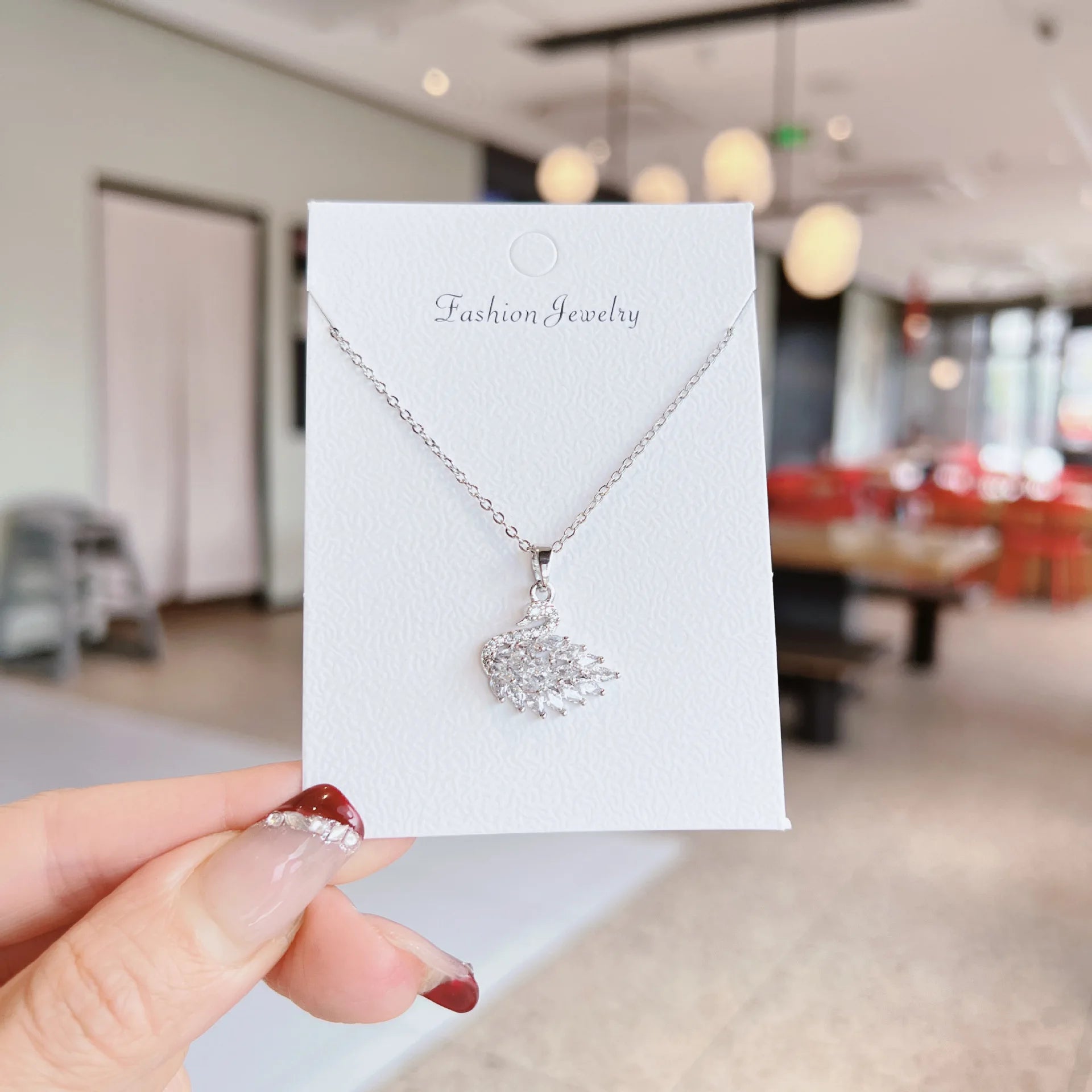 Silver crystal swan necklace, clear