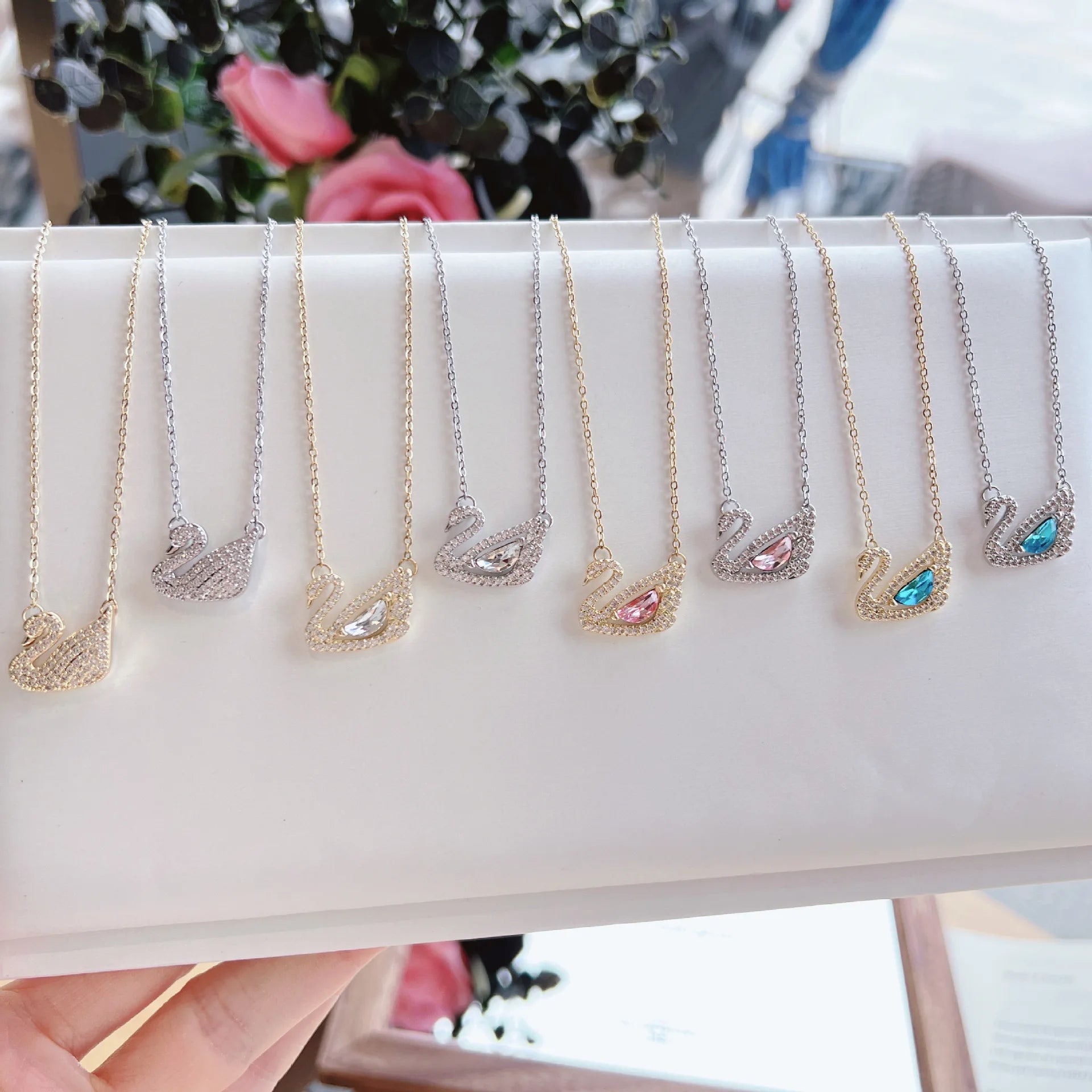 Silver crystal swan necklaces