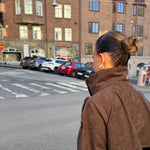 Side view of the brown cropped jacket