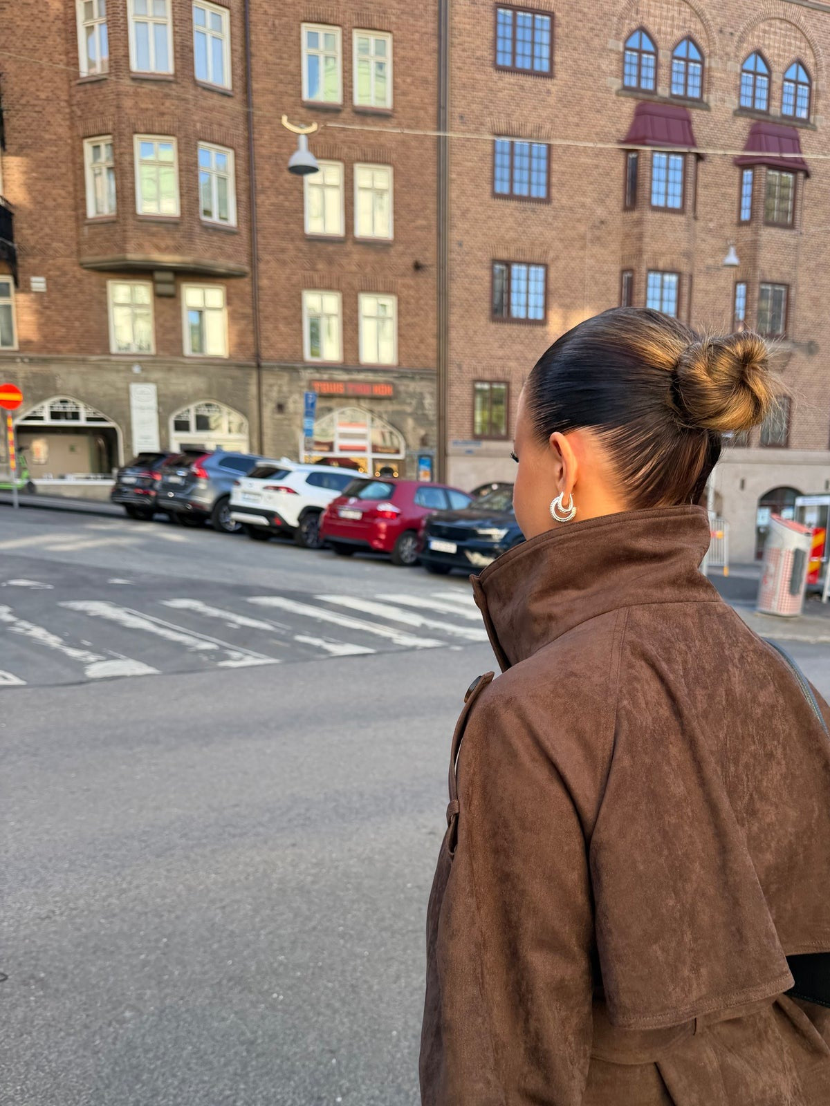Side view of the brown cropped jacket