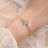 Sun and moon bracelet worn on the wrist